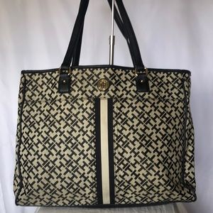 TOMMY HILFIGER black and taupe colored monogram large laptop tote bag.